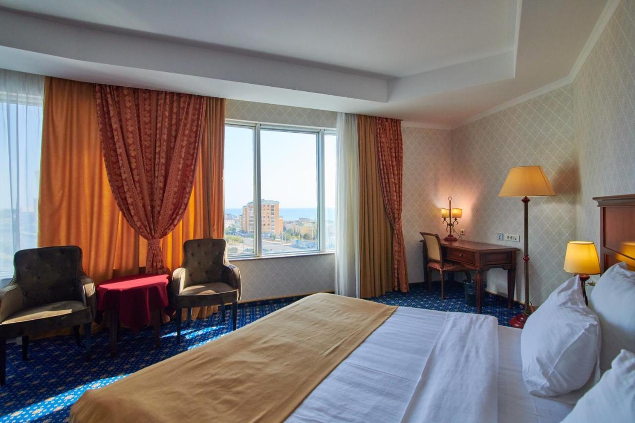 Grand Hotel Victory Aktau  Exterior photo A room at the Radisson Blu Hotel, Baku