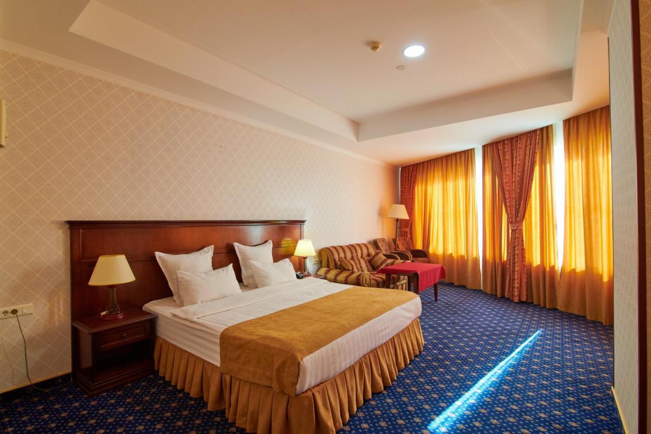 Grand Hotel Victory Aktau  Exterior photo A bedroom at the hotel