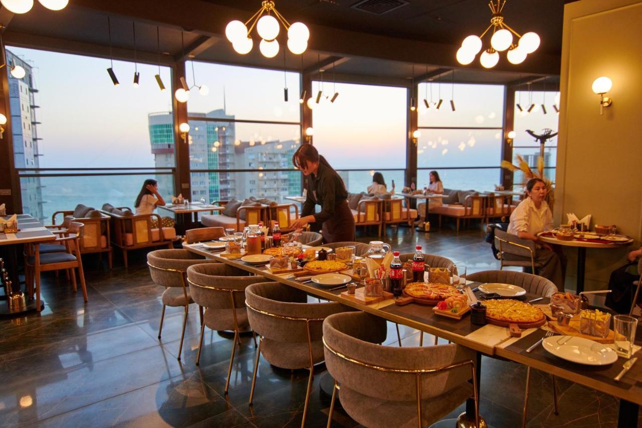 Grand Hotel Victory Aktau  Exterior photo The restaurant