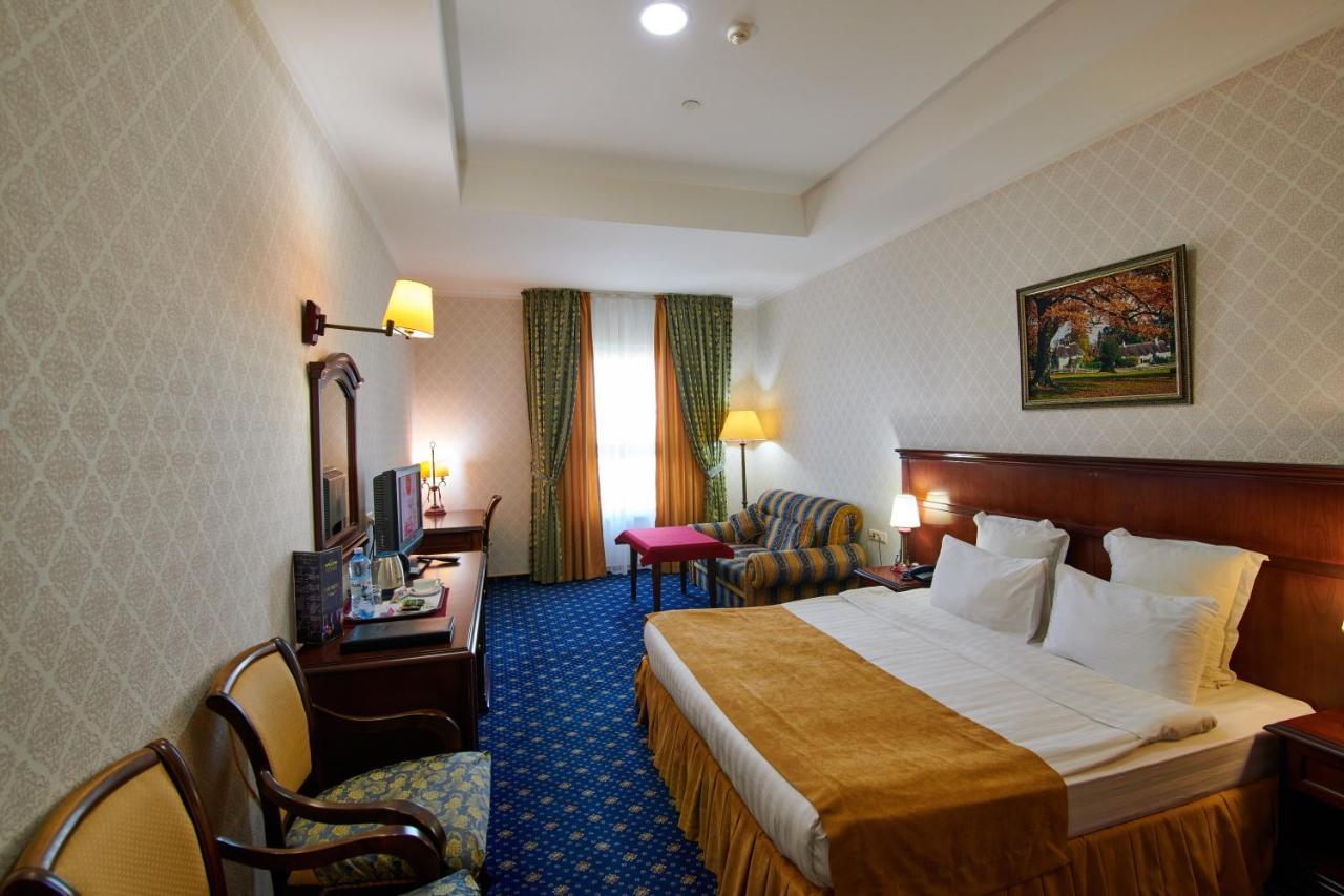 Grand Hotel Victory Aktau  Exterior photo A room at the hotel