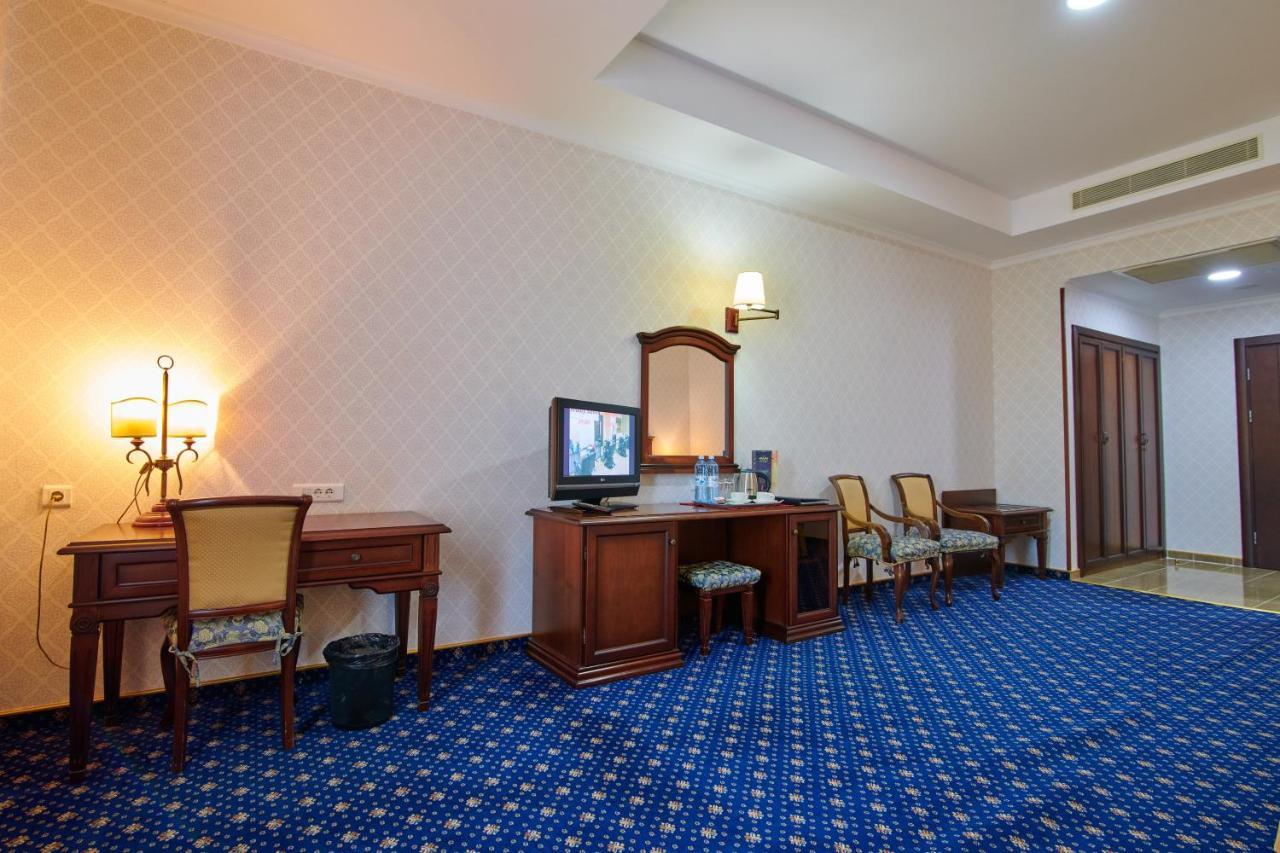 Grand Hotel Victory Aktau  Exterior photo A room at the hotel