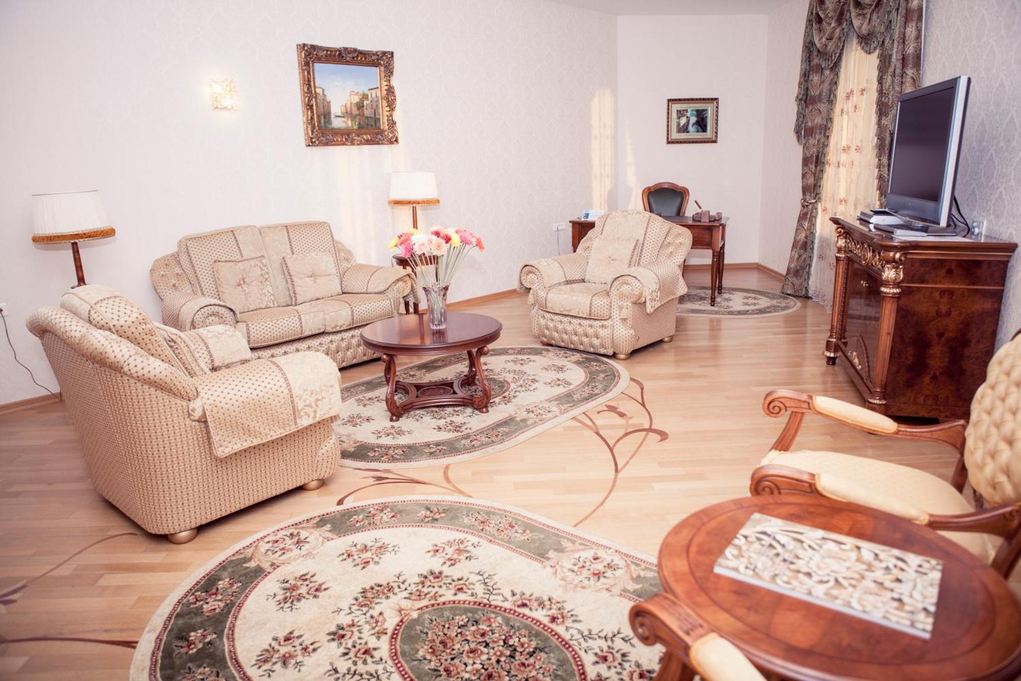 Grand Hotel Victory Aktau  Exterior photo A living room