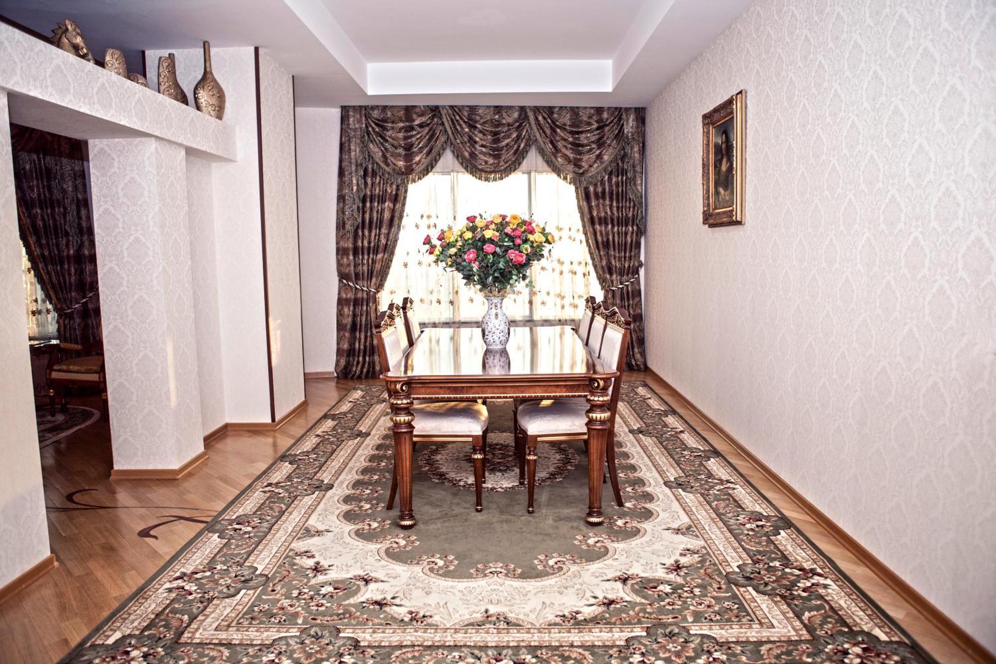Grand Hotel Victory Aktau  Exterior photo A dining room