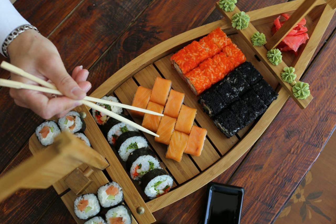 Grand Hotel Victory Aktau  Exterior photo Sushi